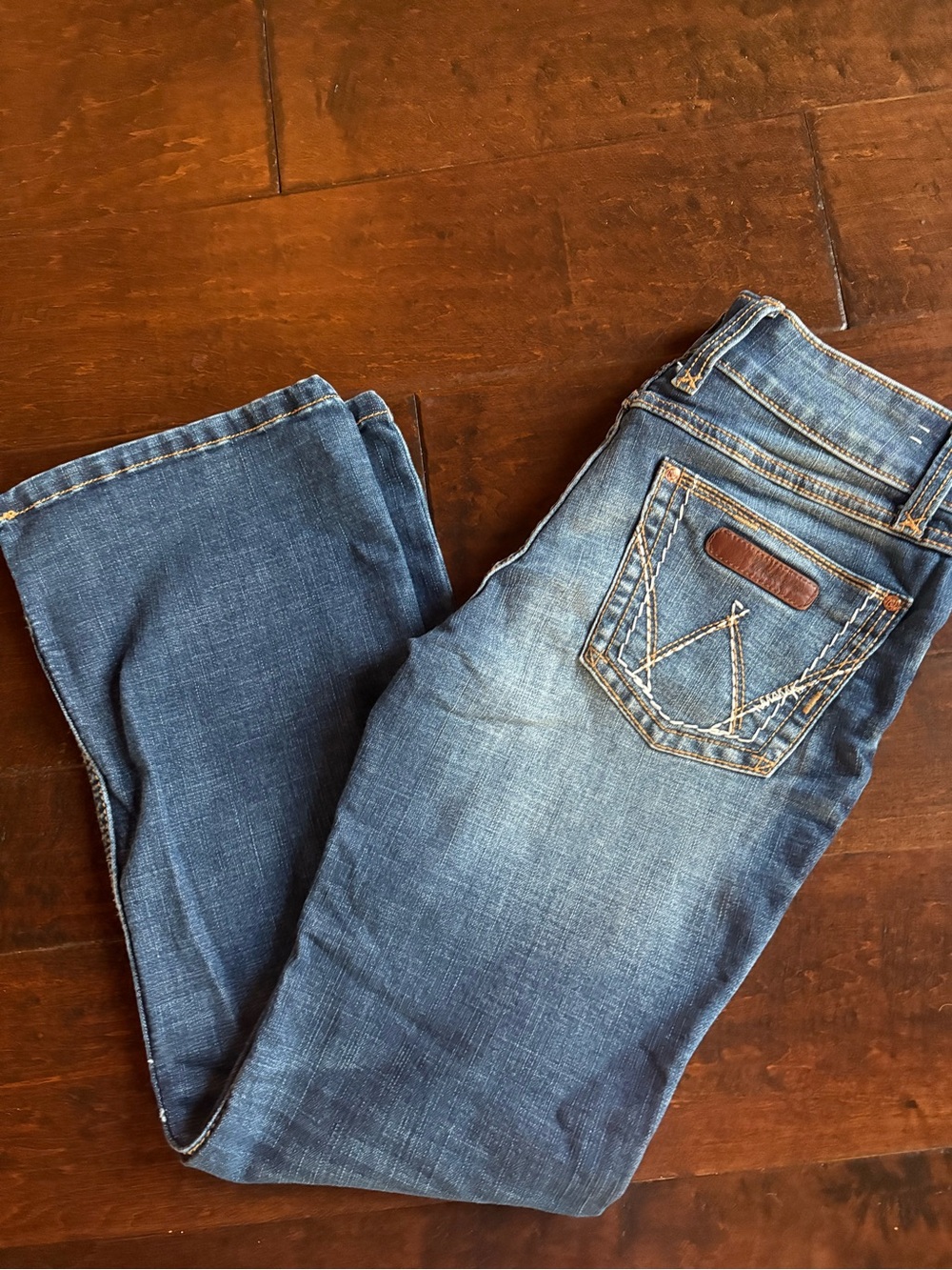 Wrangler Boot Cut Jeans in Blue with Pink Accent